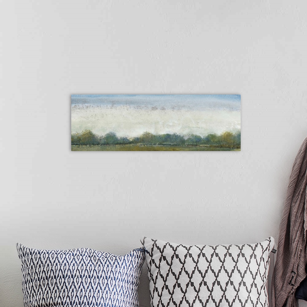 A bohemian room featuring Contemporary landscape painting of an open field with trees along the edge.