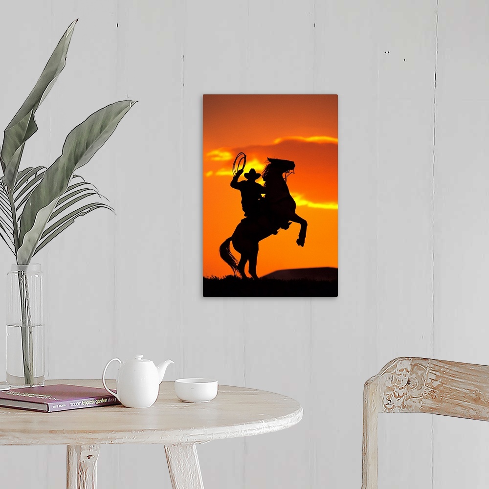 rearing horse with cowboy silhouette
