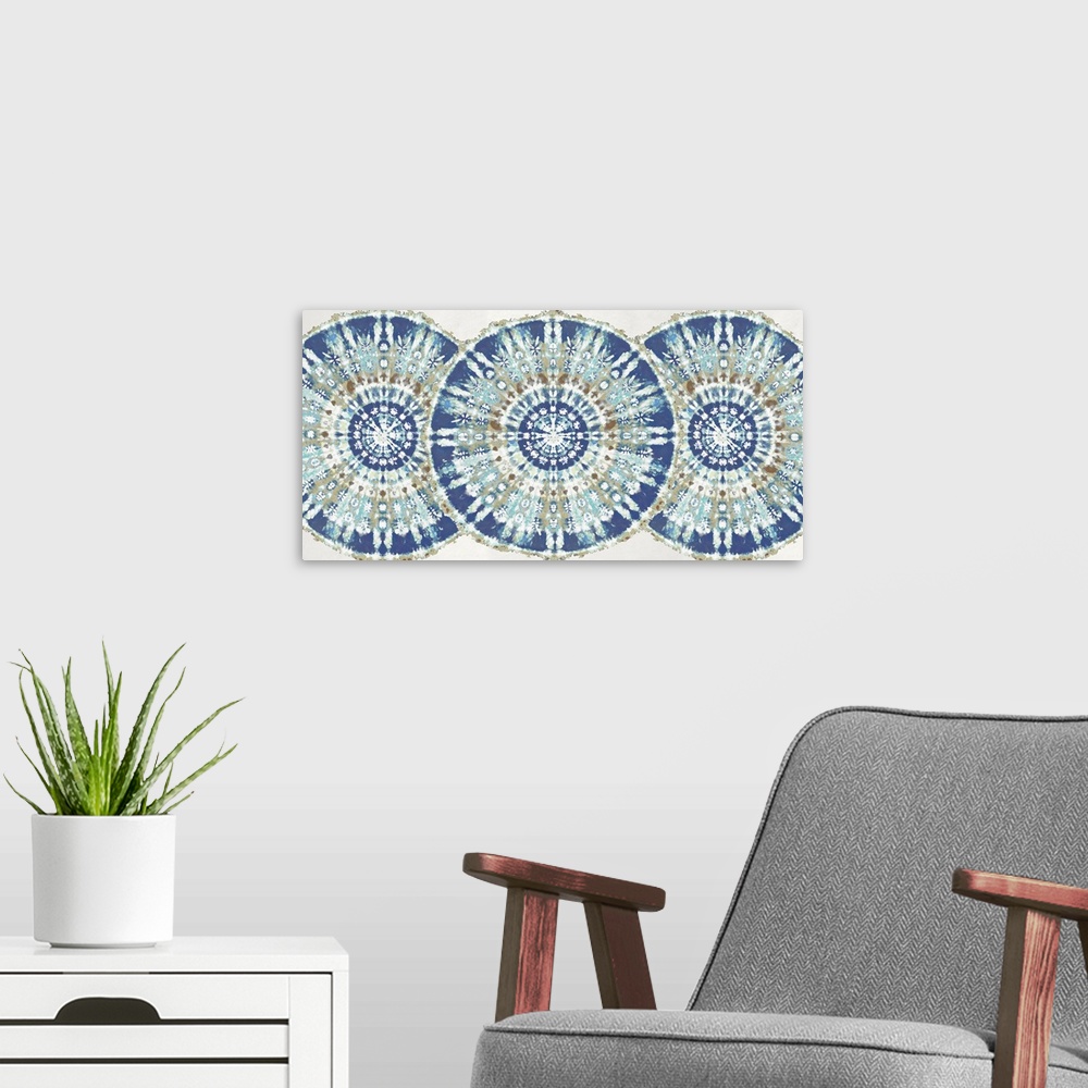 A modern room featuring Large abstract decor with three patterned, bohemian style circles overlapping in a row with blue,...