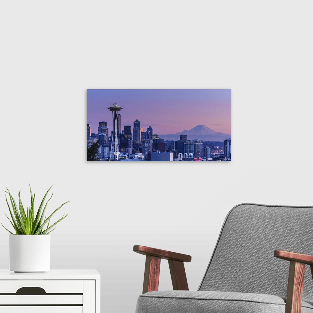 A modern room featuring Mount Rainier in the background.