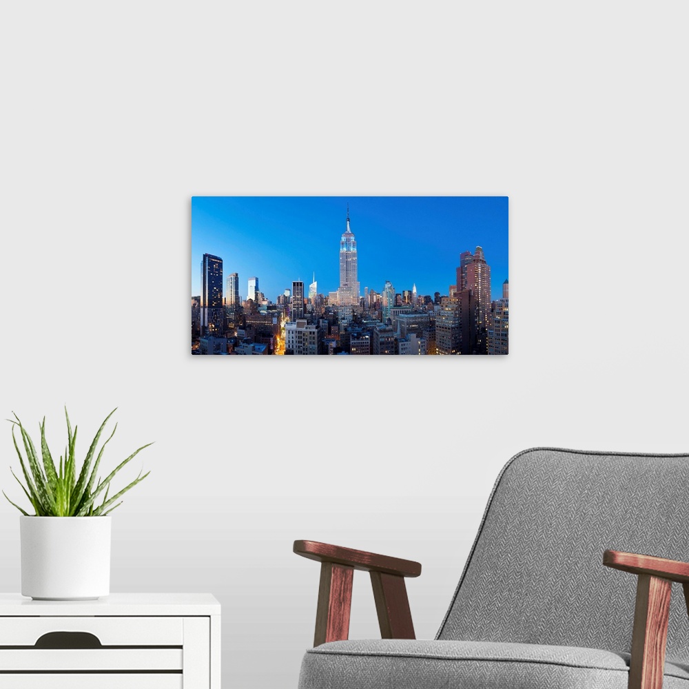 A modern room featuring United States of America, New York, New York City, Manhattan, Midtown Manhattan, elevated dusk vi...