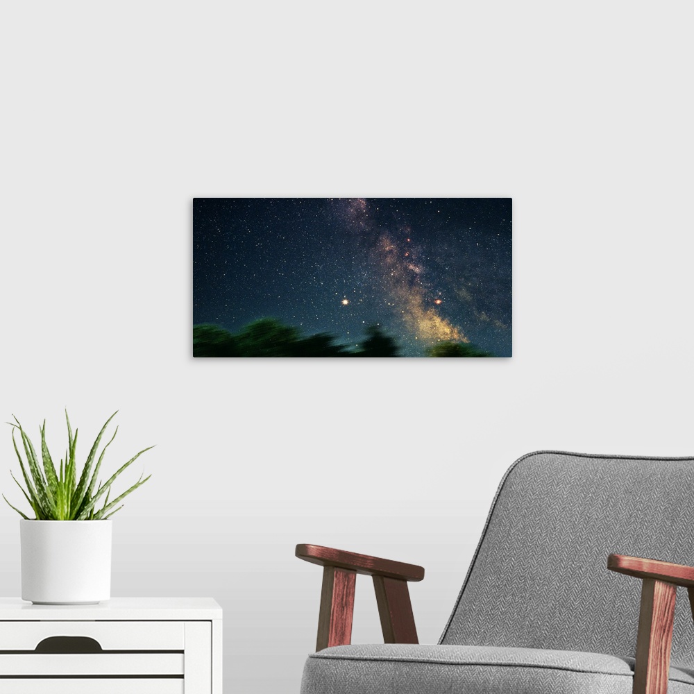 A modern room featuring Star Fields of the Milky Way (Photo Illustration)