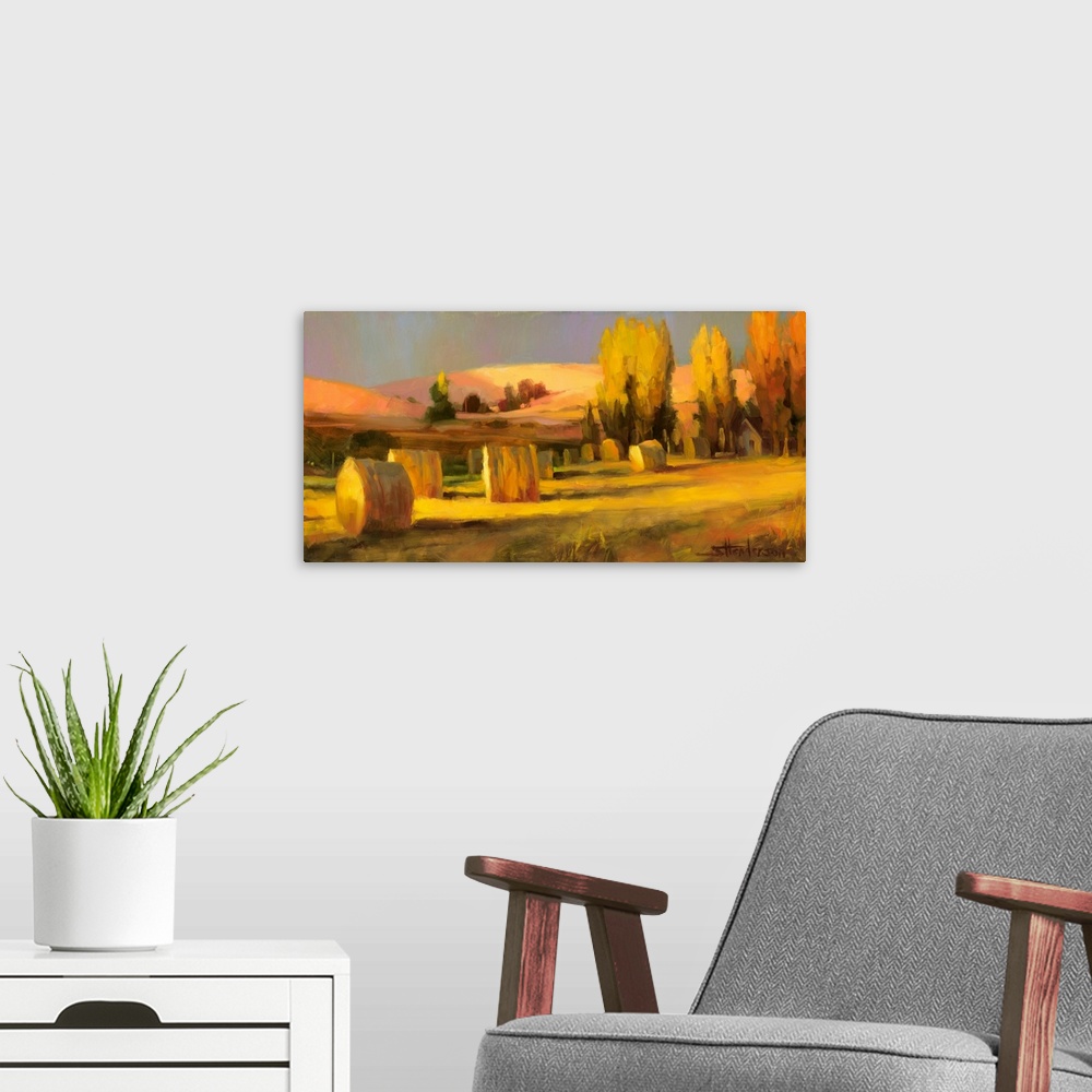 A modern room featuring Traditional impressionist landscape painting of a country farm and field in the late summer, with...
