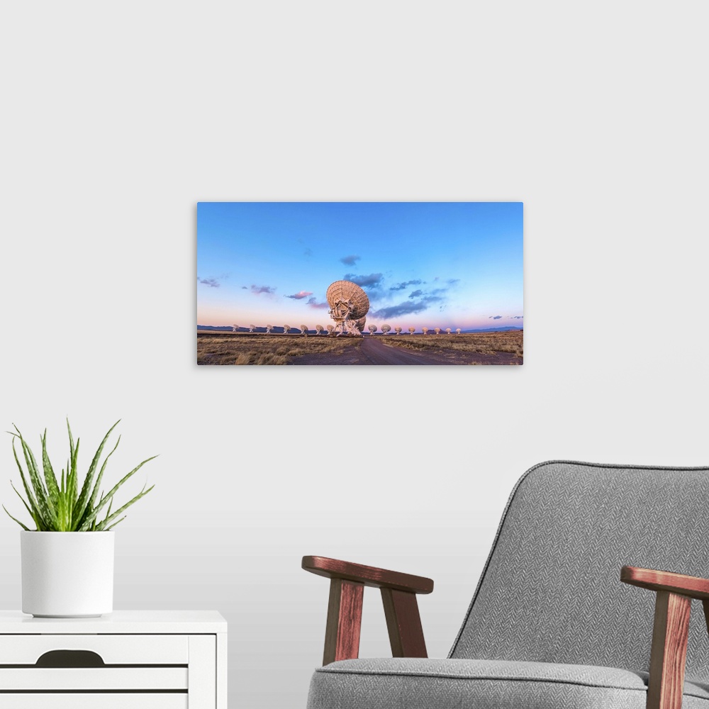 A modern room featuring March 17, 2013 - The Very Large Array (VLA) radio telescope in New Mexico at sunset. The Earth's ...