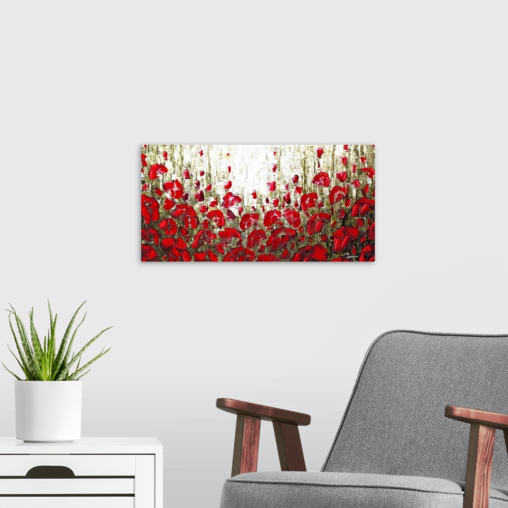 A modern room featuring Abstract landscape filled with red poppies.