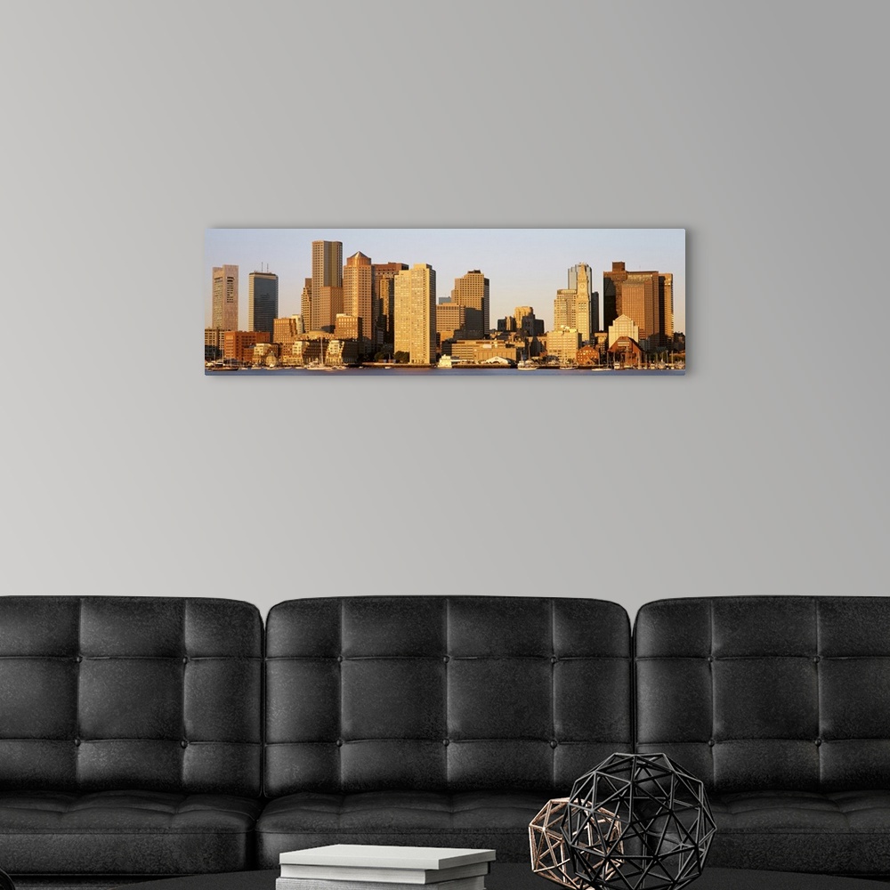 A modern room featuring Huge, panoramic photograph of the Boston skyline in the morning sun.