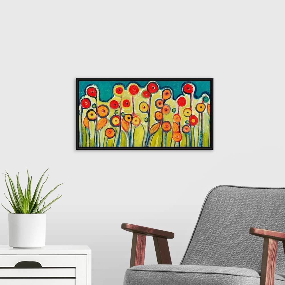A modern room featuring Abstract painting of circular flowers growing out of the ground.