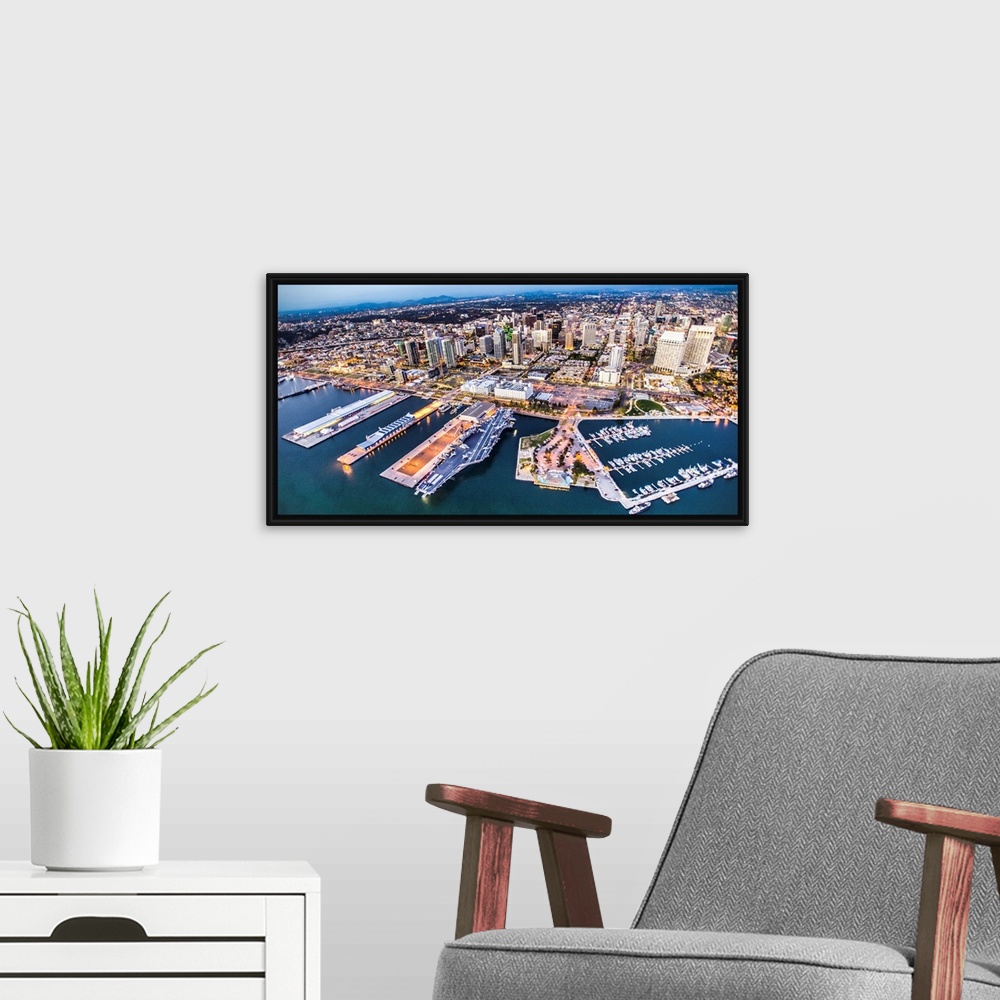 A modern room featuring The harbor and skyscrapers of San Diego in the early evening, California.