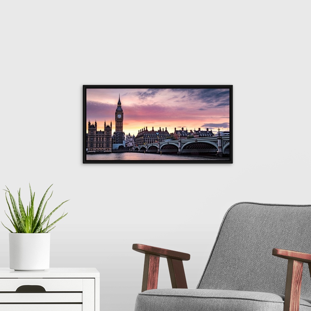 A modern room featuring Panoramic photograph of Big Ben and the Westminster Bridge with a pink and purple sunset.