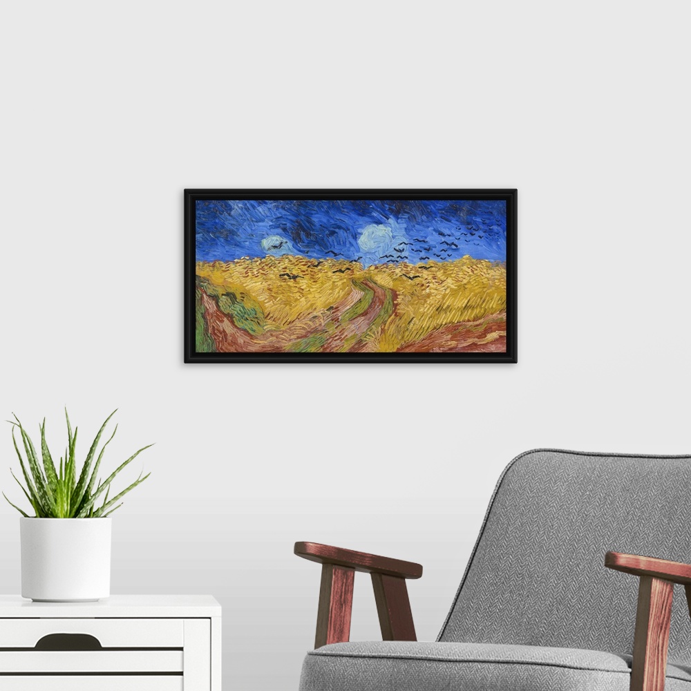 A modern room featuring Vincent van Gogh's Wheatfield with Crows (1890) famous landscape painting.