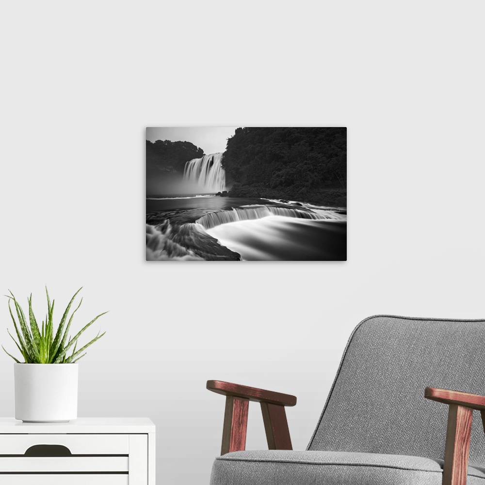 A modern room featuring Black and white image of the Huangguoshu waterfalls, the largest waterfalls in China.