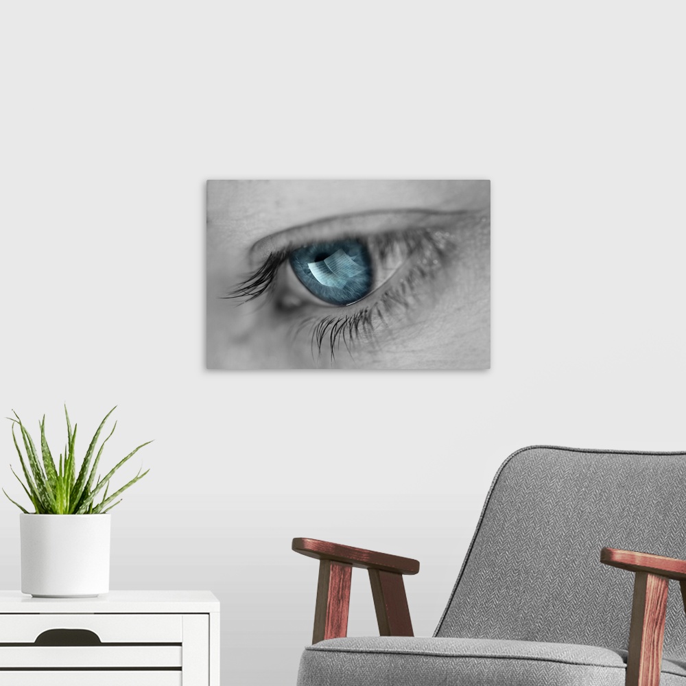 A modern room featuring A woman's eye with a turquoise iris and a reflection of sheet music.