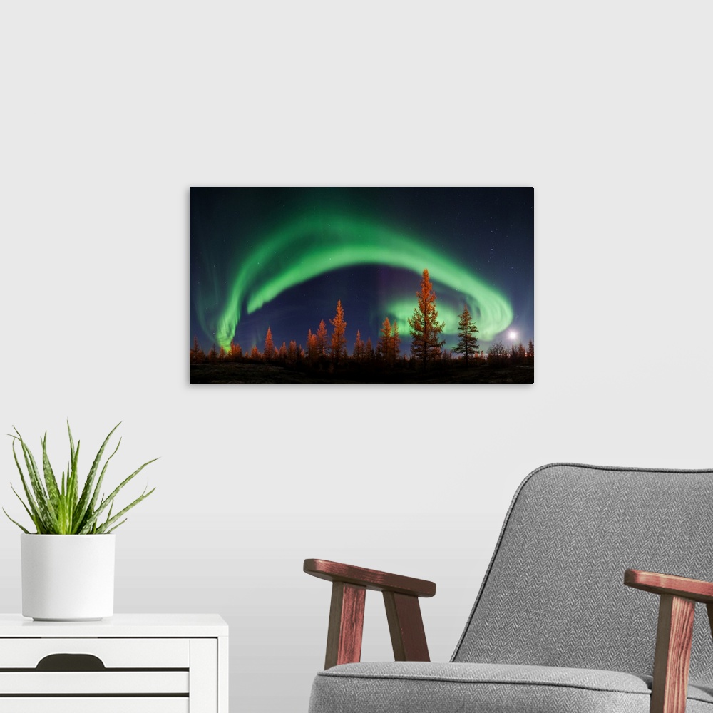 A modern room featuring Northern Lights