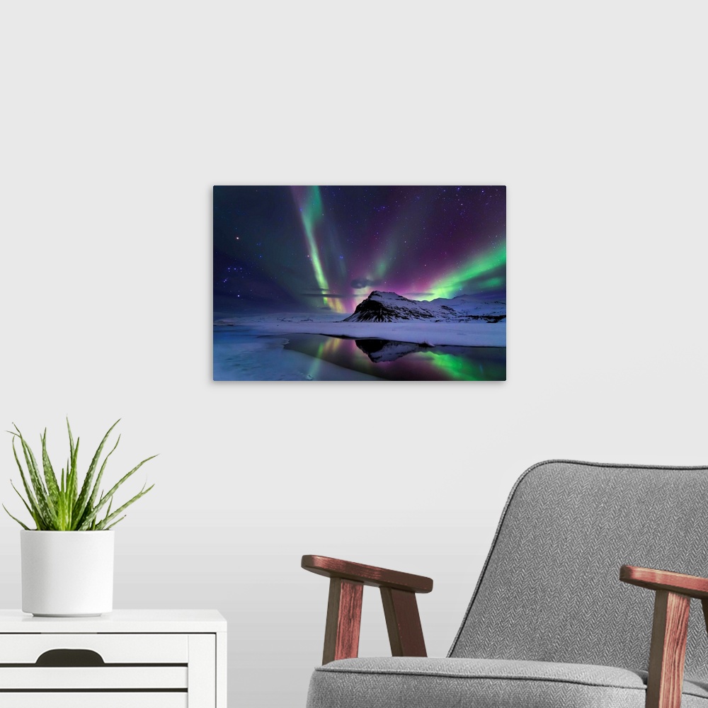 A modern room featuring Northern Lights Reflection