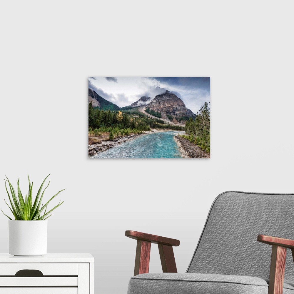 A modern room featuring Kicking Horse River adjacent to city of Field, Canada