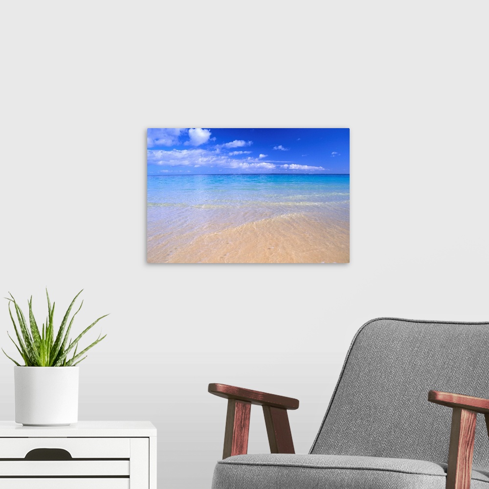 A modern room featuring Blue Sky With Clouds, Calm Shoreline, Turquoise Water On Horizon