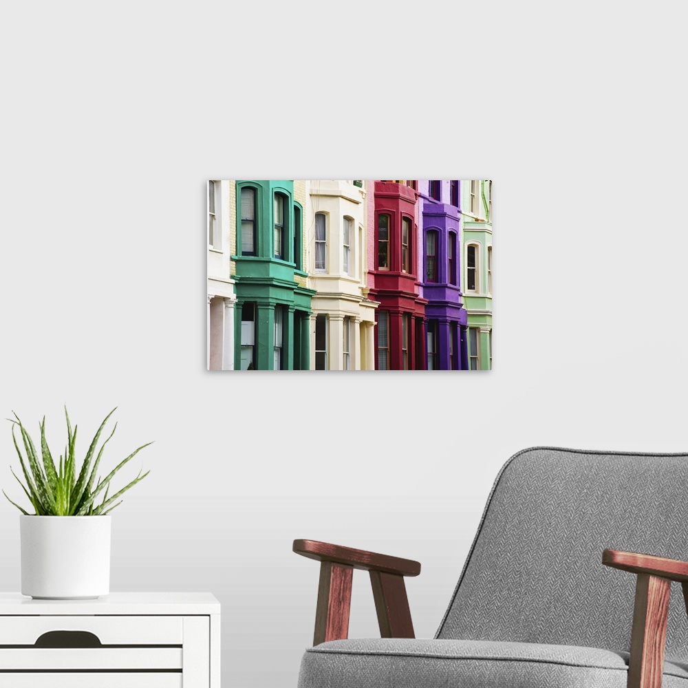 A modern room featuring Colourful residential buildings in a row, Notting Hill, London, England