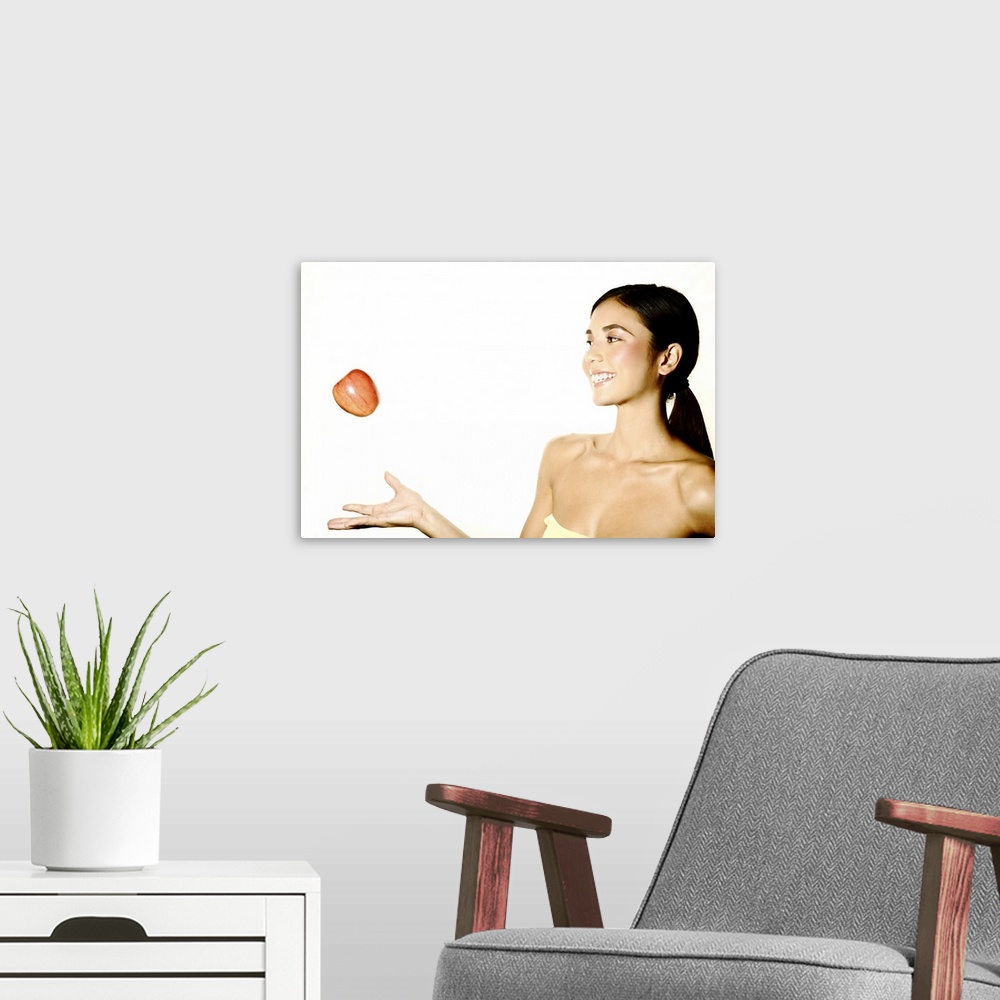 A modern room featuring Hawaii, Studio Headshot Of A Beautiful Girl Holding An Apple.