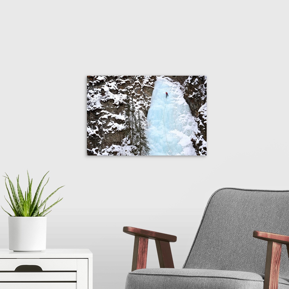 A modern room featuring Woman Ice Climber Ascends A Large Icefall In Southcentral Alaska