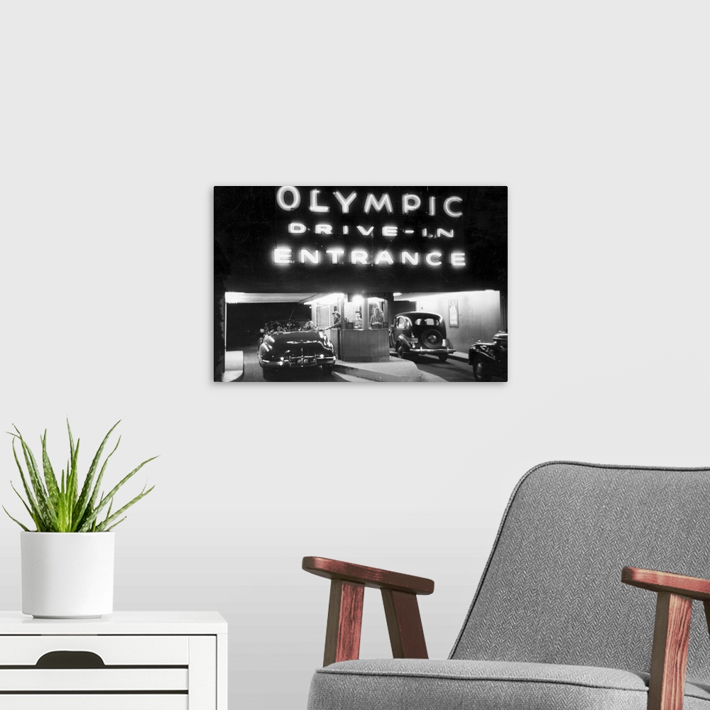 A modern room featuring People buying tickets at the Olympic Drive-In in the Hollywood district of Los Angeles, Californi...