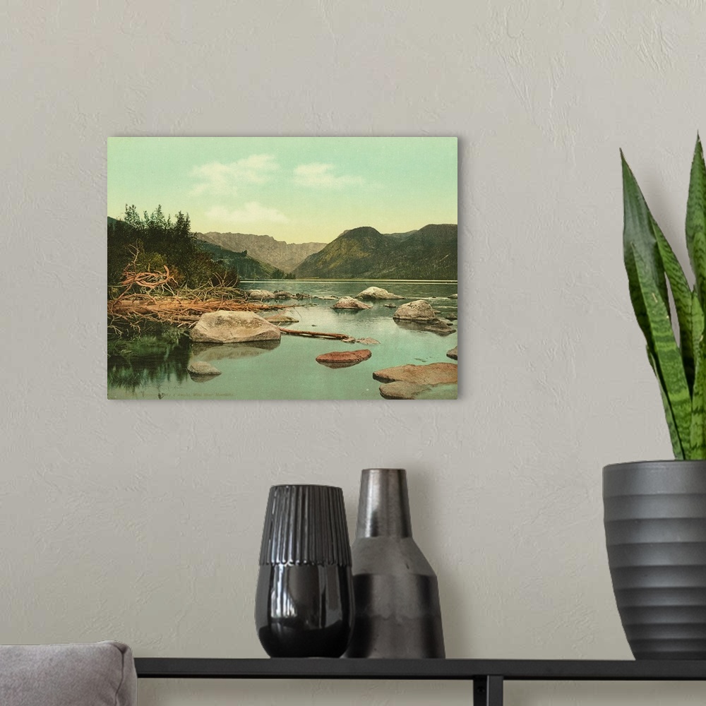 A modern room featuring Hand colored photograph of Wyoming. Lake D'amalia, wind river mountains.