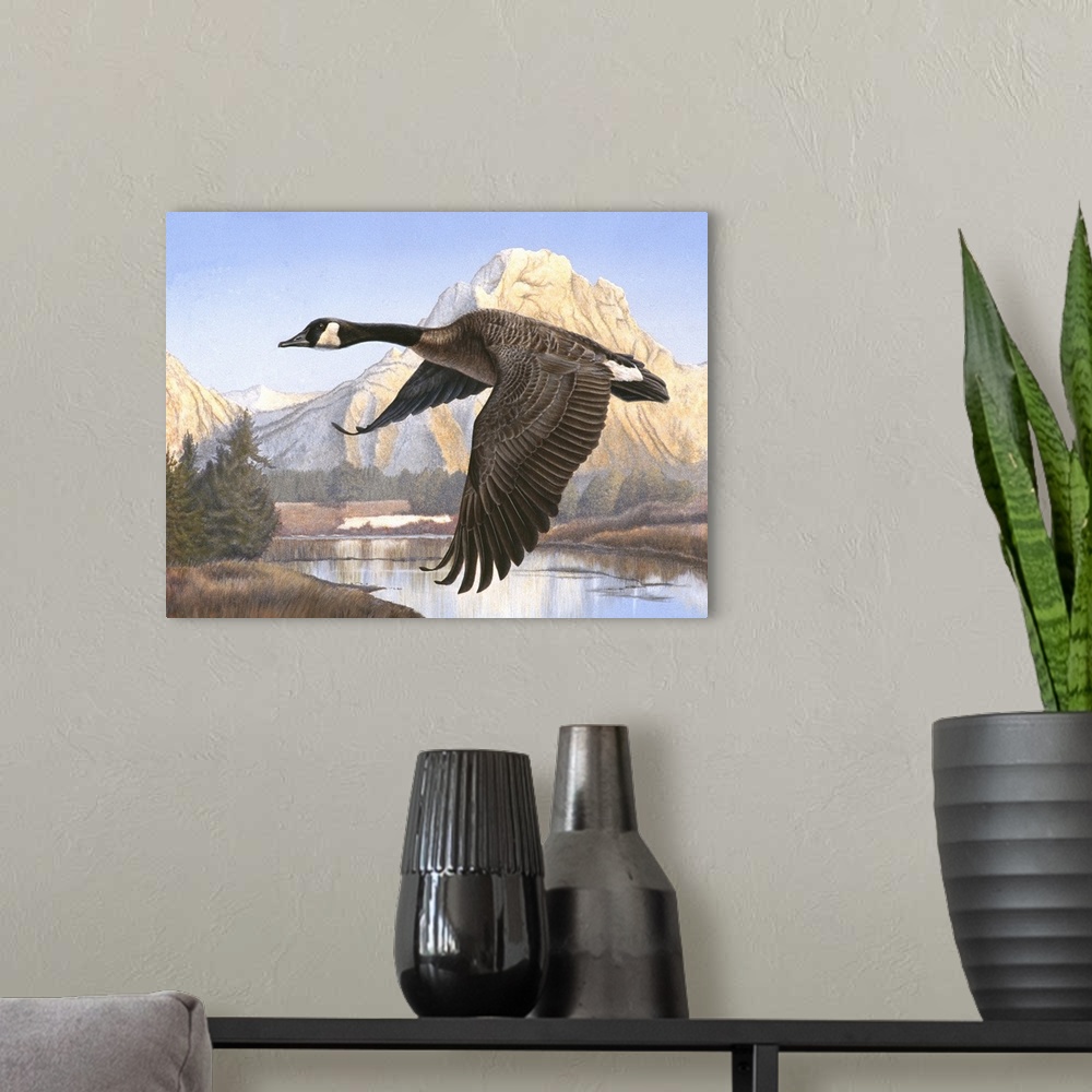 A modern room featuring A goose flying over a body of water with a mountain in the background.