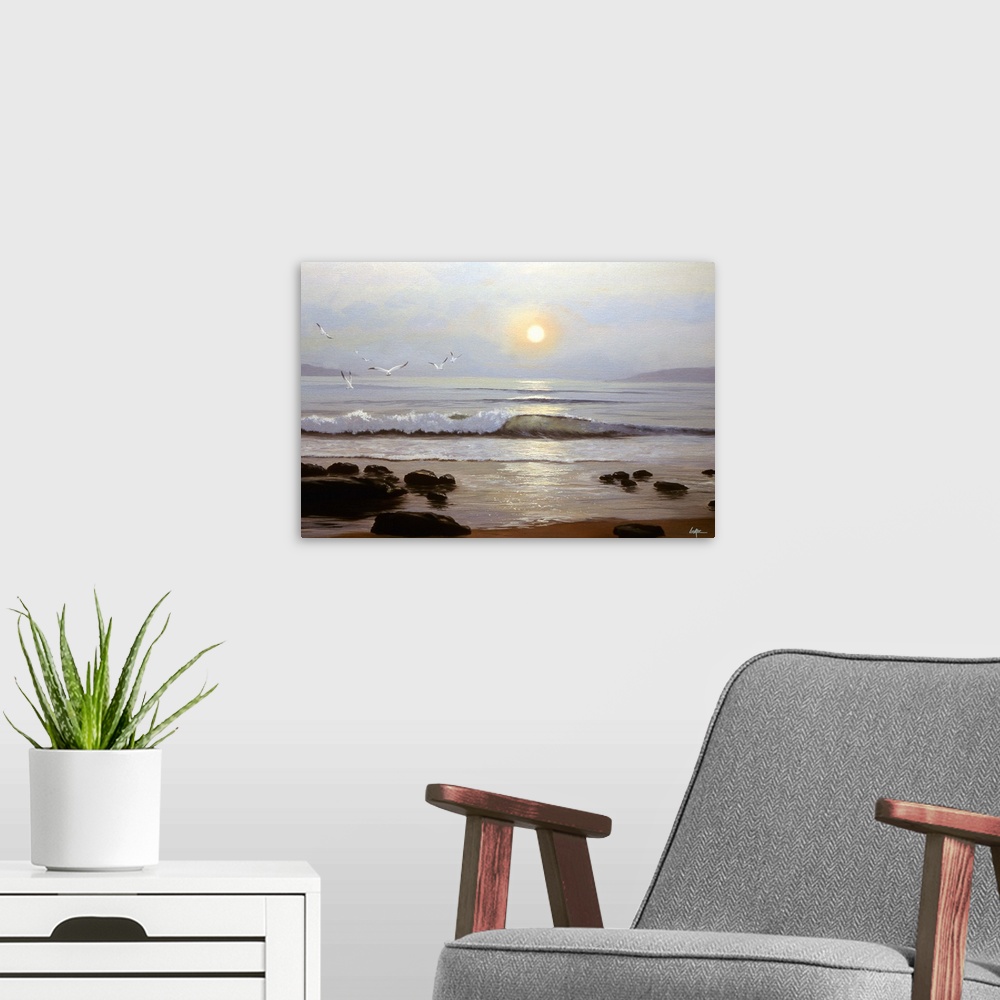 A modern room featuring Contemporary painting of the ocean shore with shallow waves at sunset.
