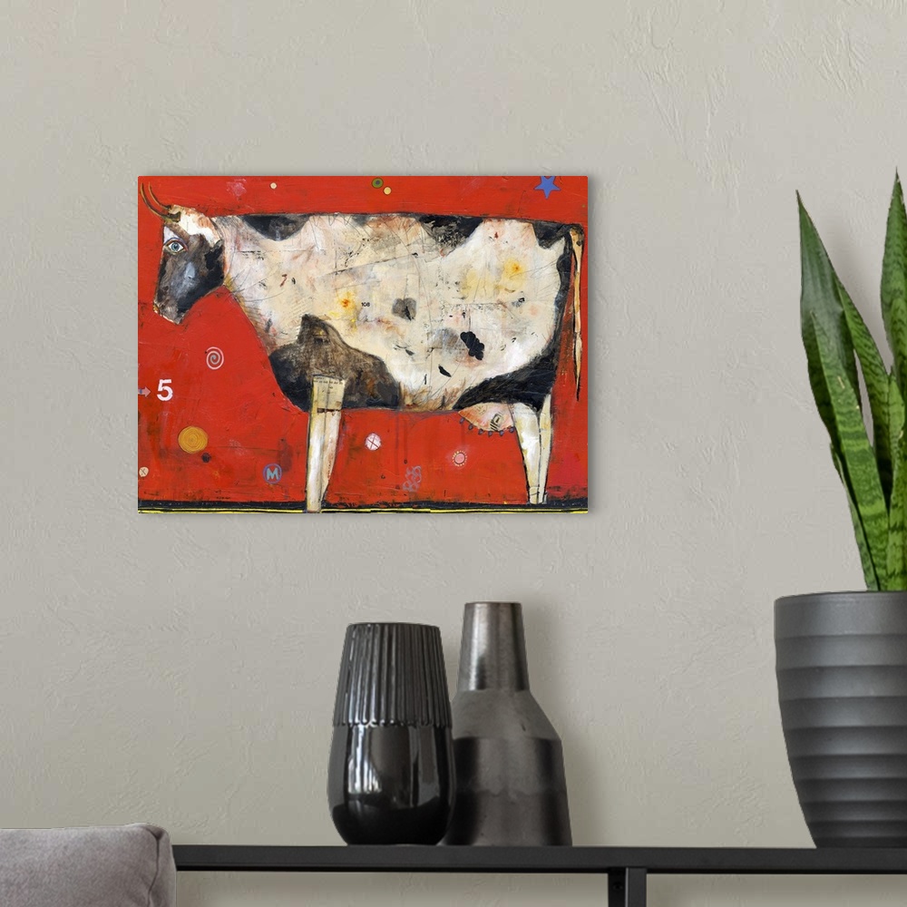 A modern room featuring Lighthearted contemporary painting of cow against a red background.