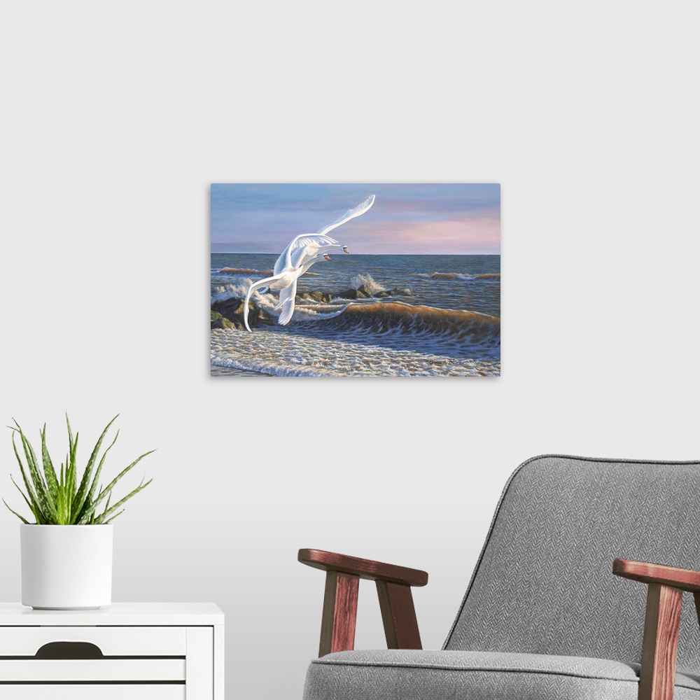 A modern room featuring Contemporary artwork of swans flying along the edge of a beach,