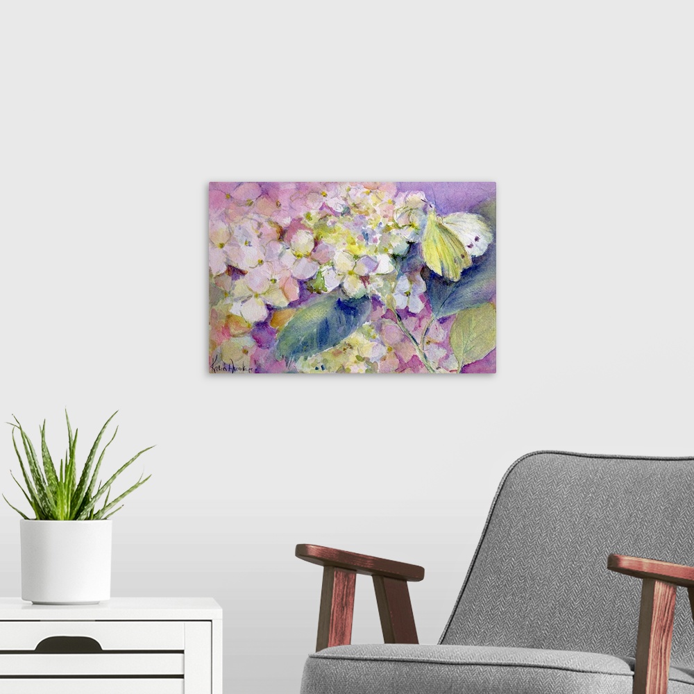 A modern room featuring Oversized, landscape, floral watercolor painting of a pale clouded yellow butterfly (colias hyale...