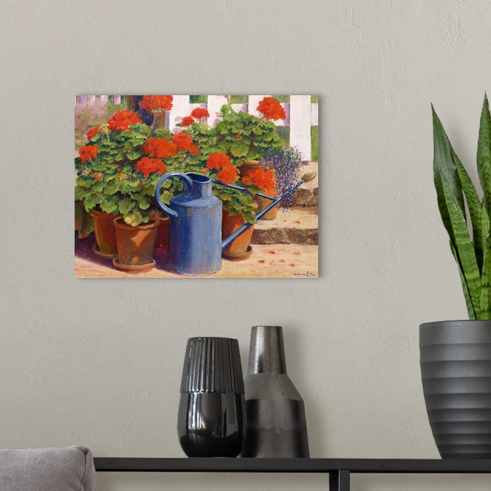 A modern room featuring Docor perfect for the home of painted potted flowers with a watering can in front.