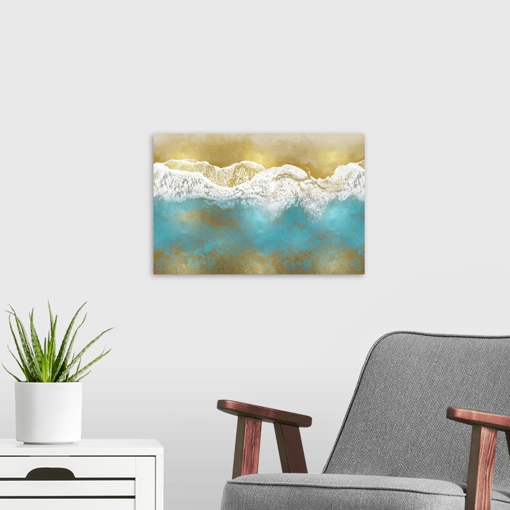 A modern room featuring One artwork in a series of aerial shots of a beach as blue waves break upon a gold shore.