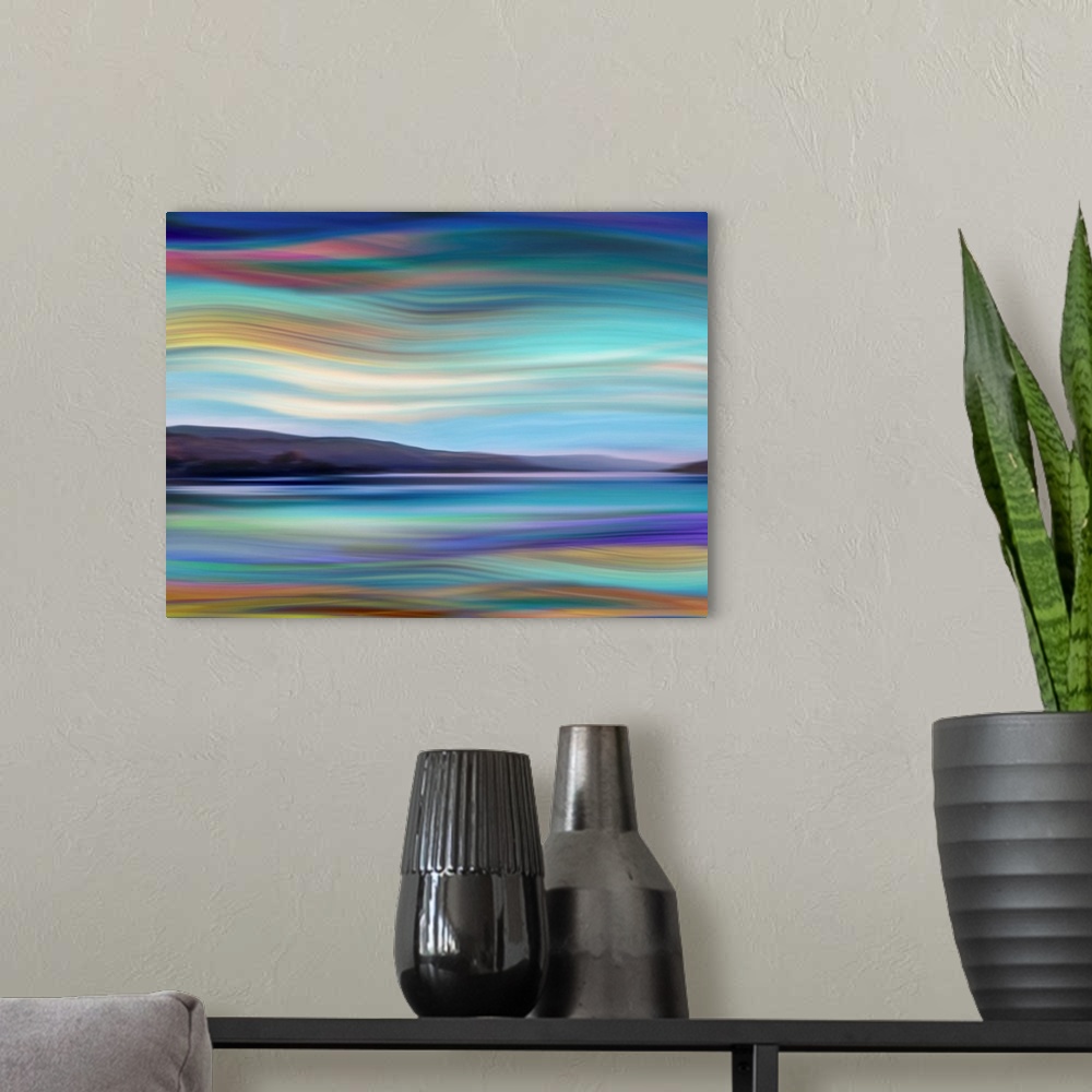 A modern room featuring Large abstract art with a colorful and wavy landscape.