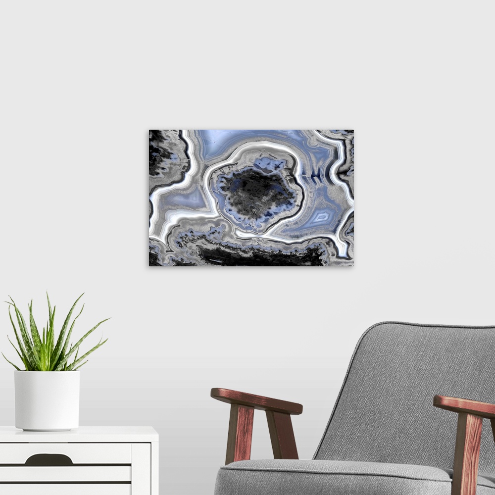 A modern room featuring Decor with a blue, white, black, and gray agate pattern.