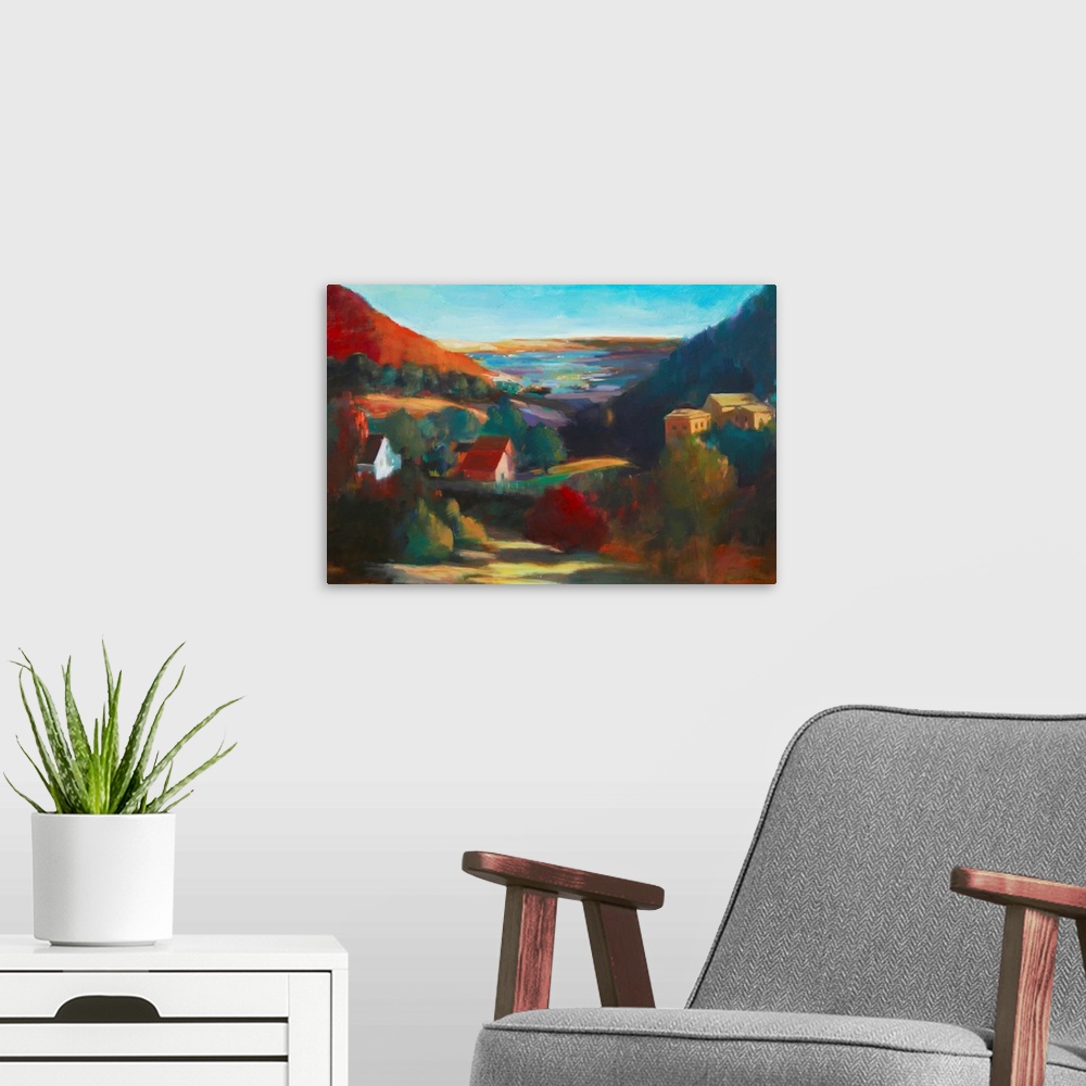 A modern room featuring Contemporary landscape painting of a small town in a colorful valley surrounded by mountains.