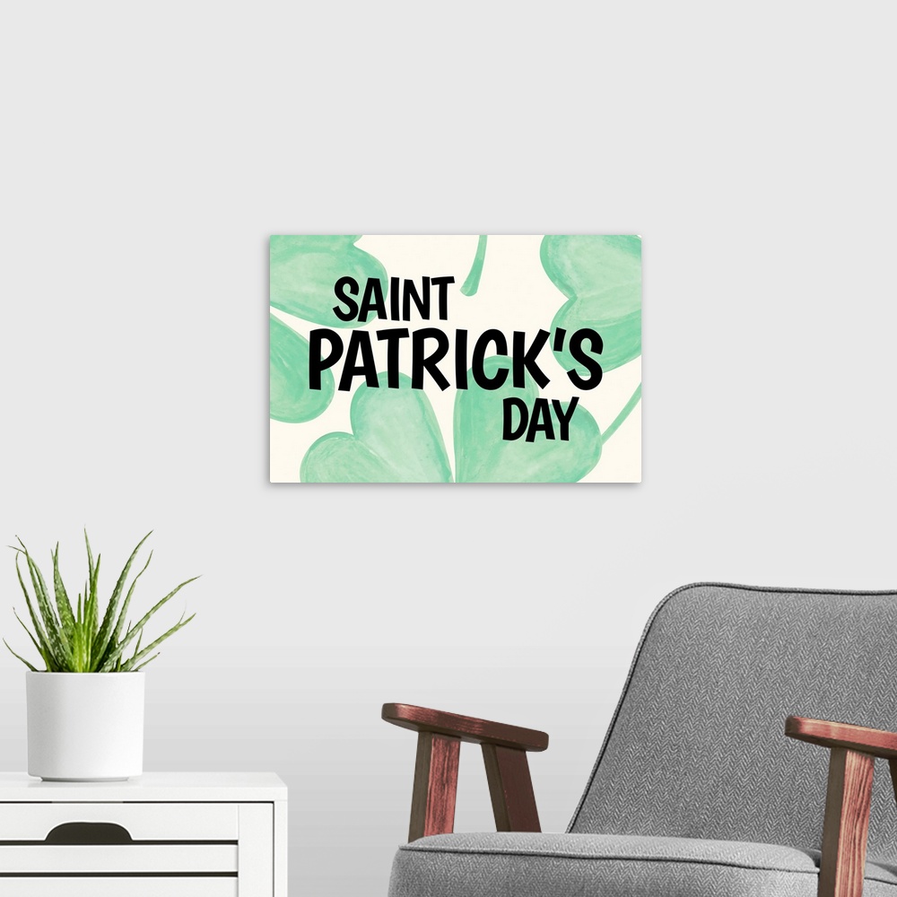 A modern room featuring "Saint Patrick's Day" written in black over large illustrated clovers.