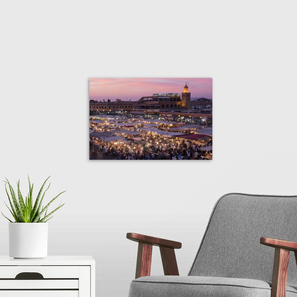 A modern room featuring Africa, Morocco. Sunset over the famous Djemaa El-Fna square in Marrakech
