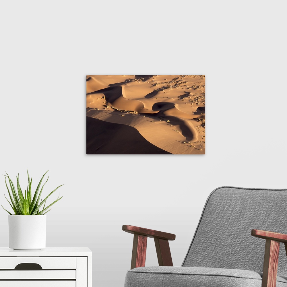 A modern room featuring Africa, Namibia, Namib-Naukluft Park. Abstract aerial of sand dunes.