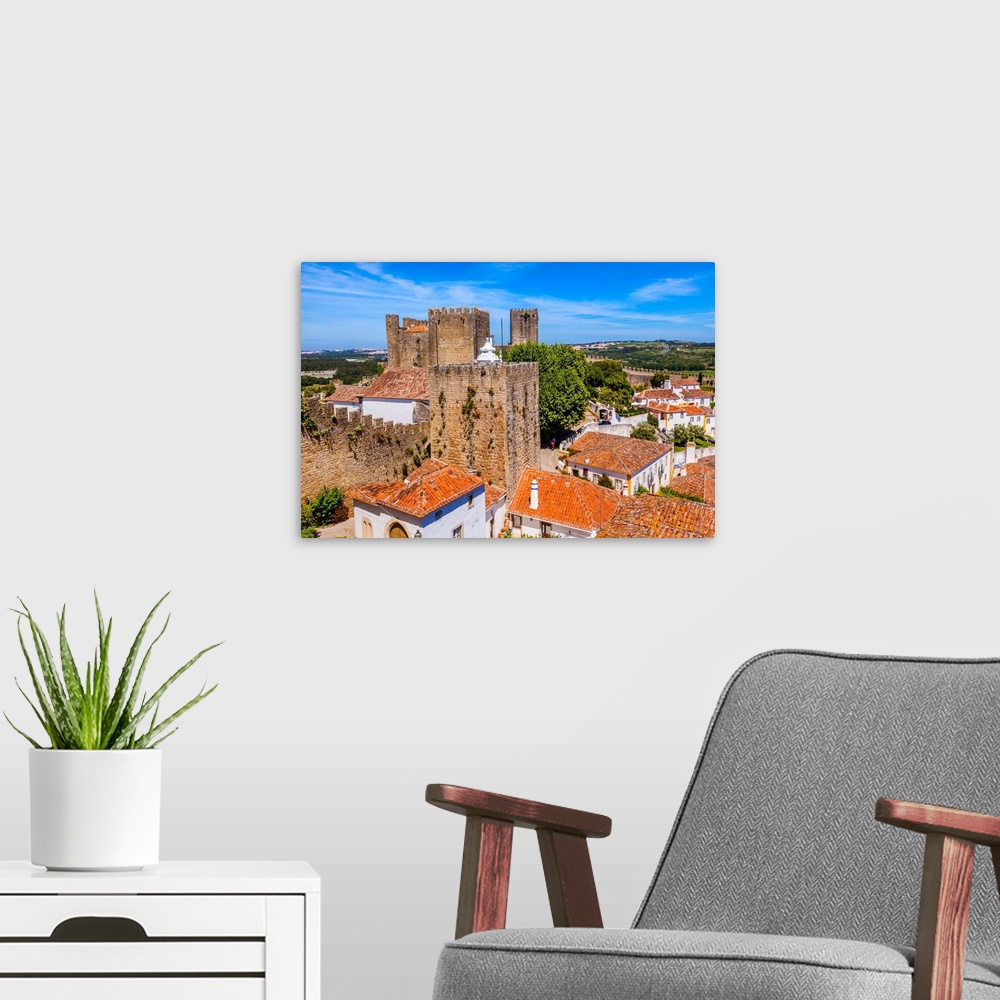 A modern room featuring Castle Wals Turrets Towers Medieval Town Obidos Portugal. Castle and walls built in 11th century ...