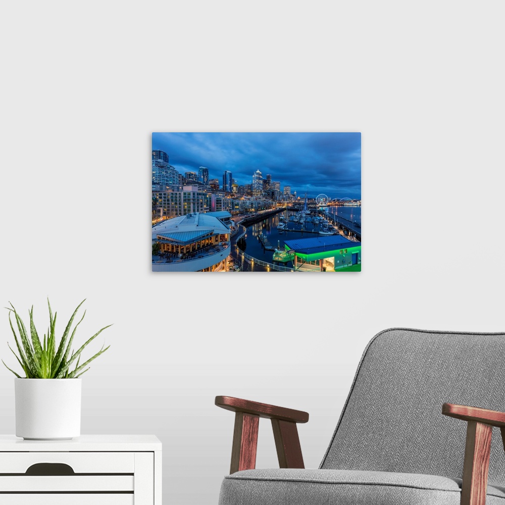A modern room featuring City skyline at dusk from Bell Street Pier in Seattle, Washington, USA