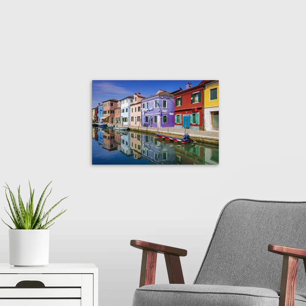 A modern room featuring Colorful houses and canal, Burano, Veneto, Italy.
