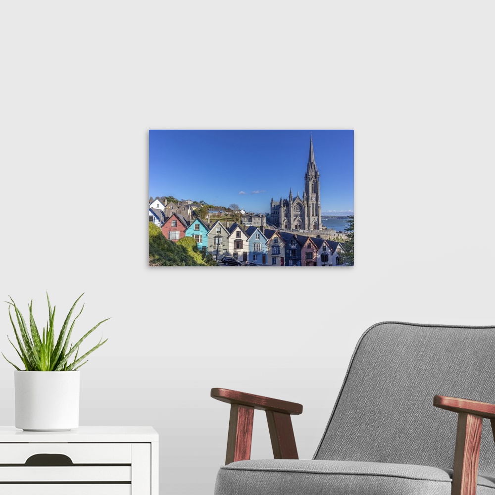 A modern room featuring Deck of Card Houses with St. Colman's Cathedral in Cobh, Ireland