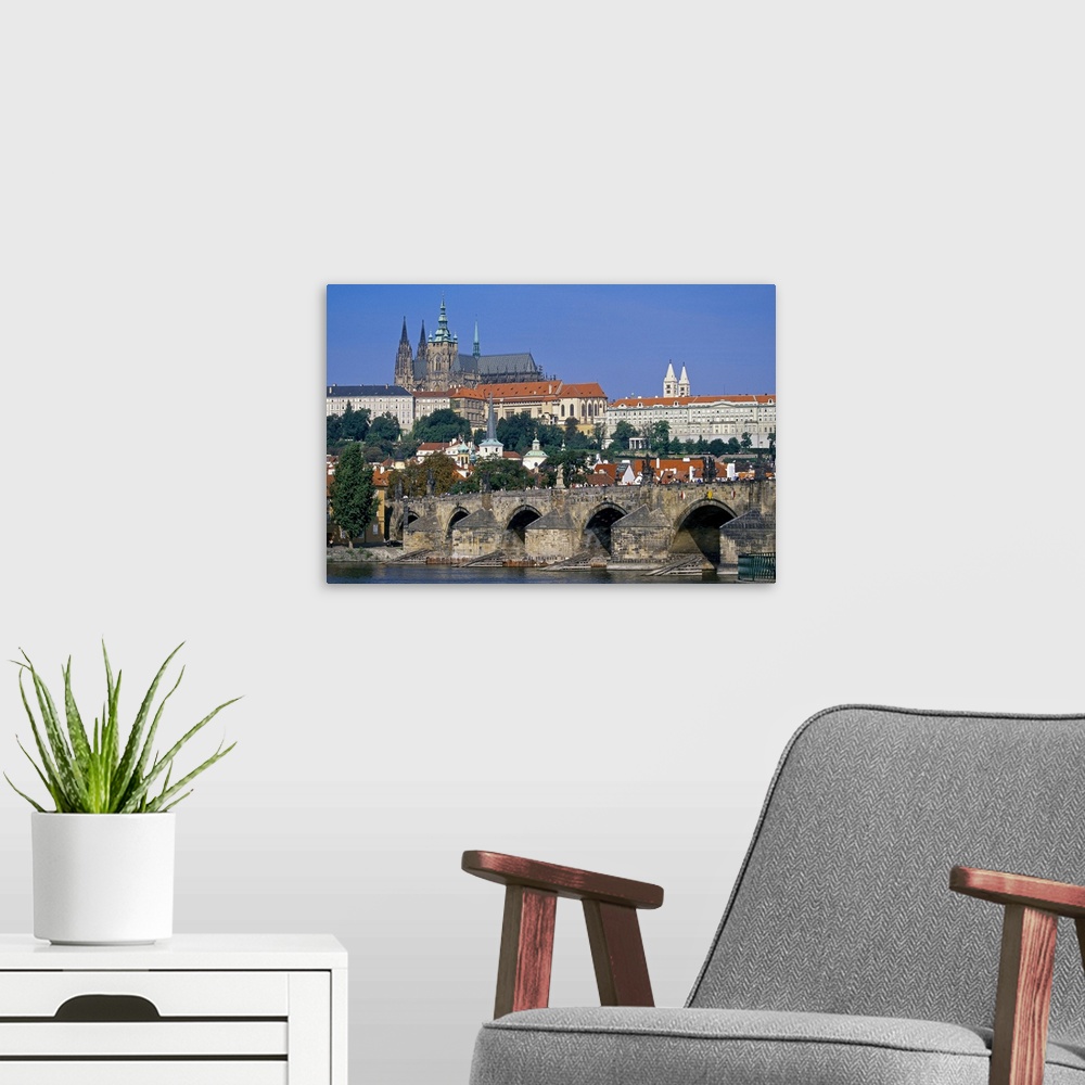A modern room featuring Eastern Europe, Czech Republic, Prague, St. Charles Bridge across the Vltava River with Prague Ca...
