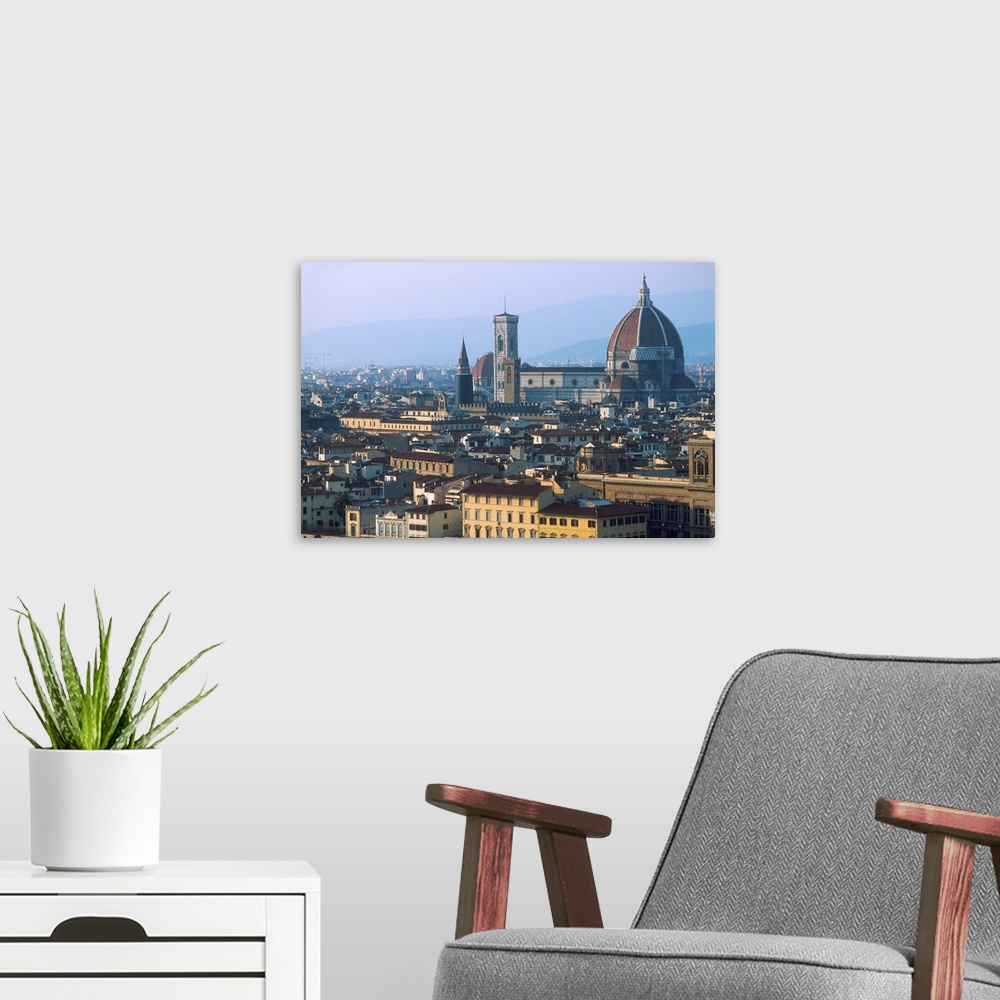 A modern room featuring Europe, Italy, Florence..Cityscape with The Duomo dominating the skyline.