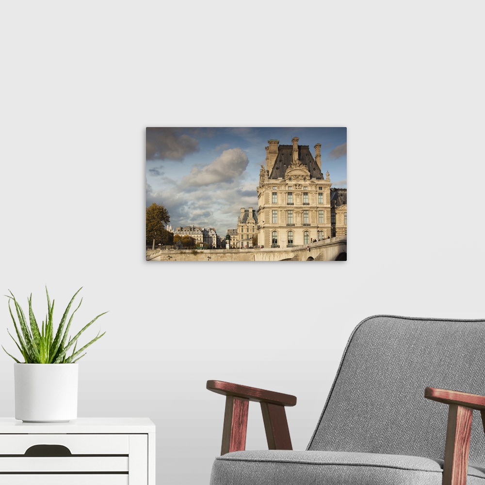 A modern room featuring France, Paris, Musee Du Louvre Building In Autumn