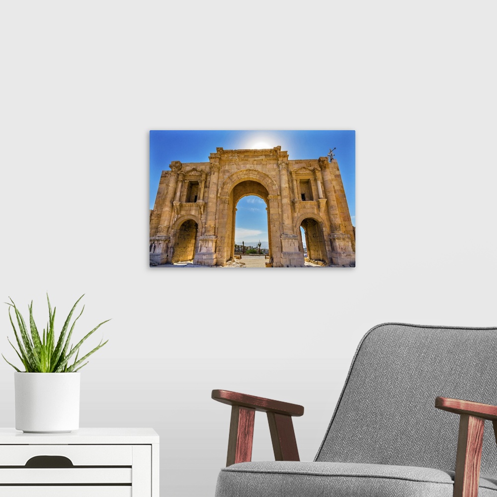 A modern room featuring Hadrian's Arch Gate Sun Ancient Roman City Jerash Jordan. Jerash came to power 300 BC to 100 AD a...