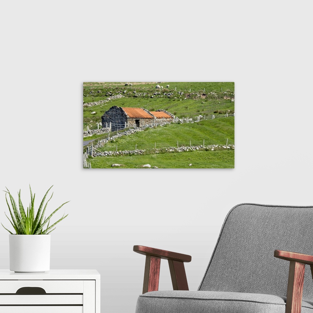 A modern room featuring Europe, Ireland, County Mayo, Barnabaun Point. Irish countryside with stone wall and red-roofed h...