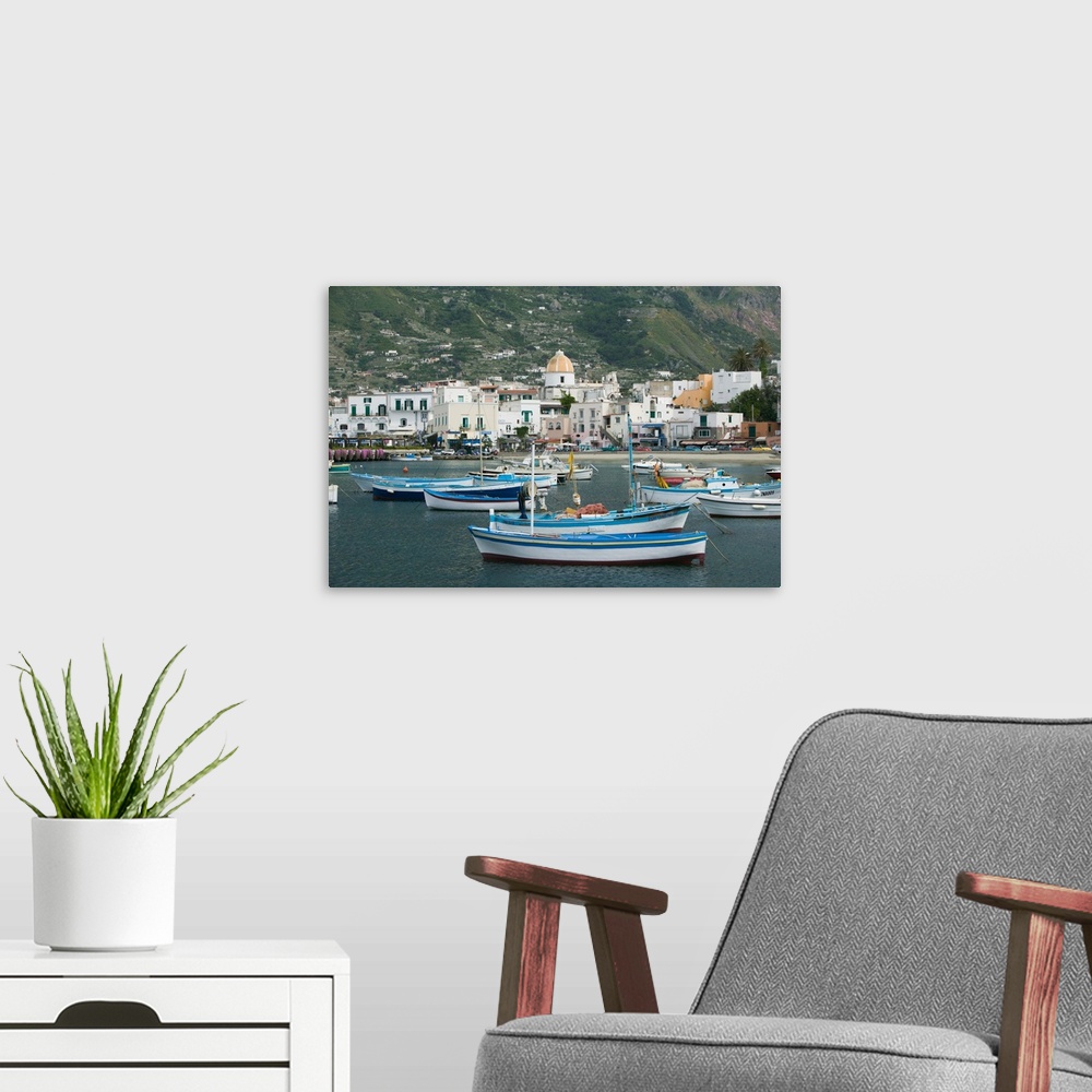 A modern room featuring ITALY-Campania-(Bay of Naples)-ISCHIA-FORIO:.Town View from Fishing Port / Daytime