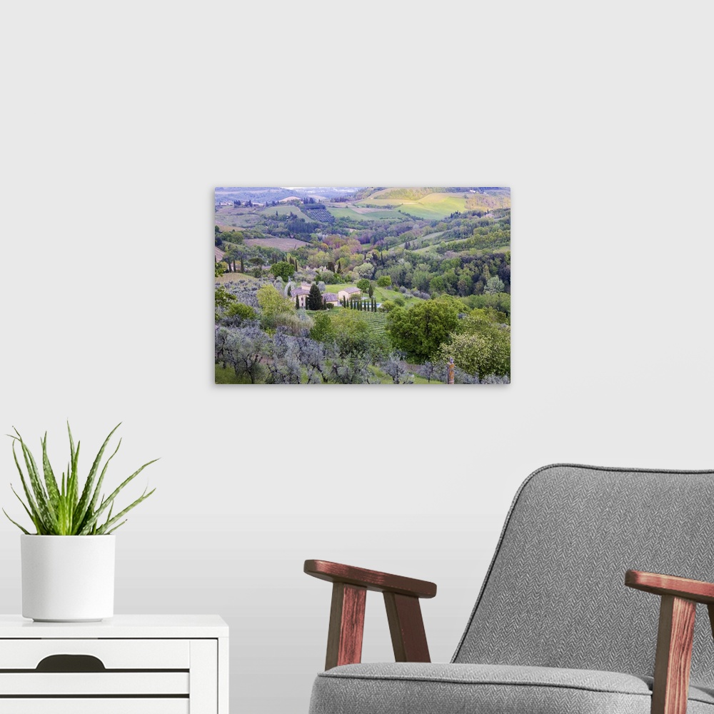 A modern room featuring Landscape view from the top of the walls of San Gimignano. Tuscany, Italy.