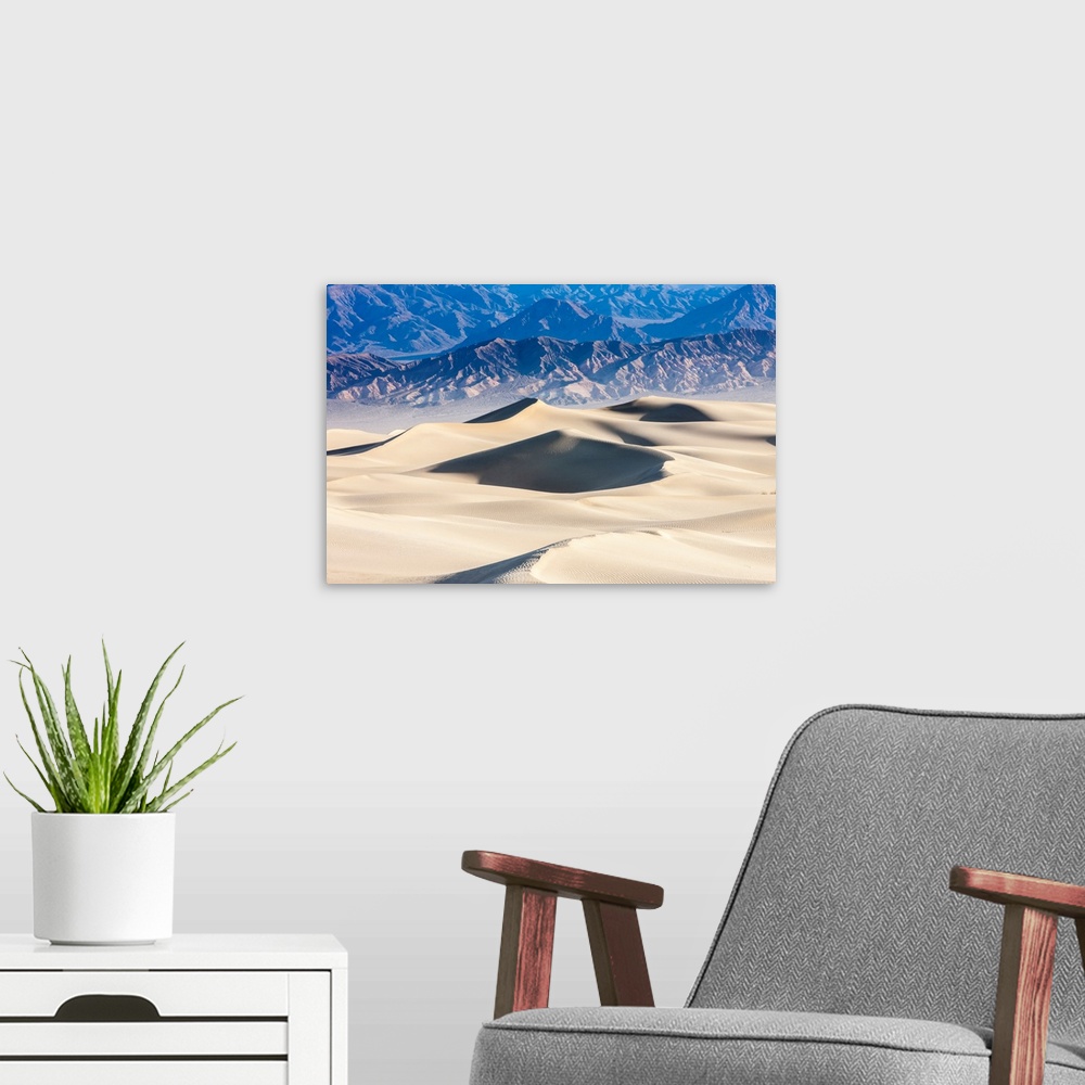 A modern room featuring Mesquite Sand Dunes. Grapevine Mountains in the Background. Death Valley. California.